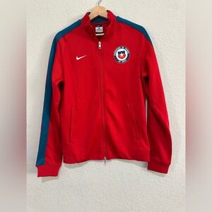 Nike Red Jacket with Blue Emblem